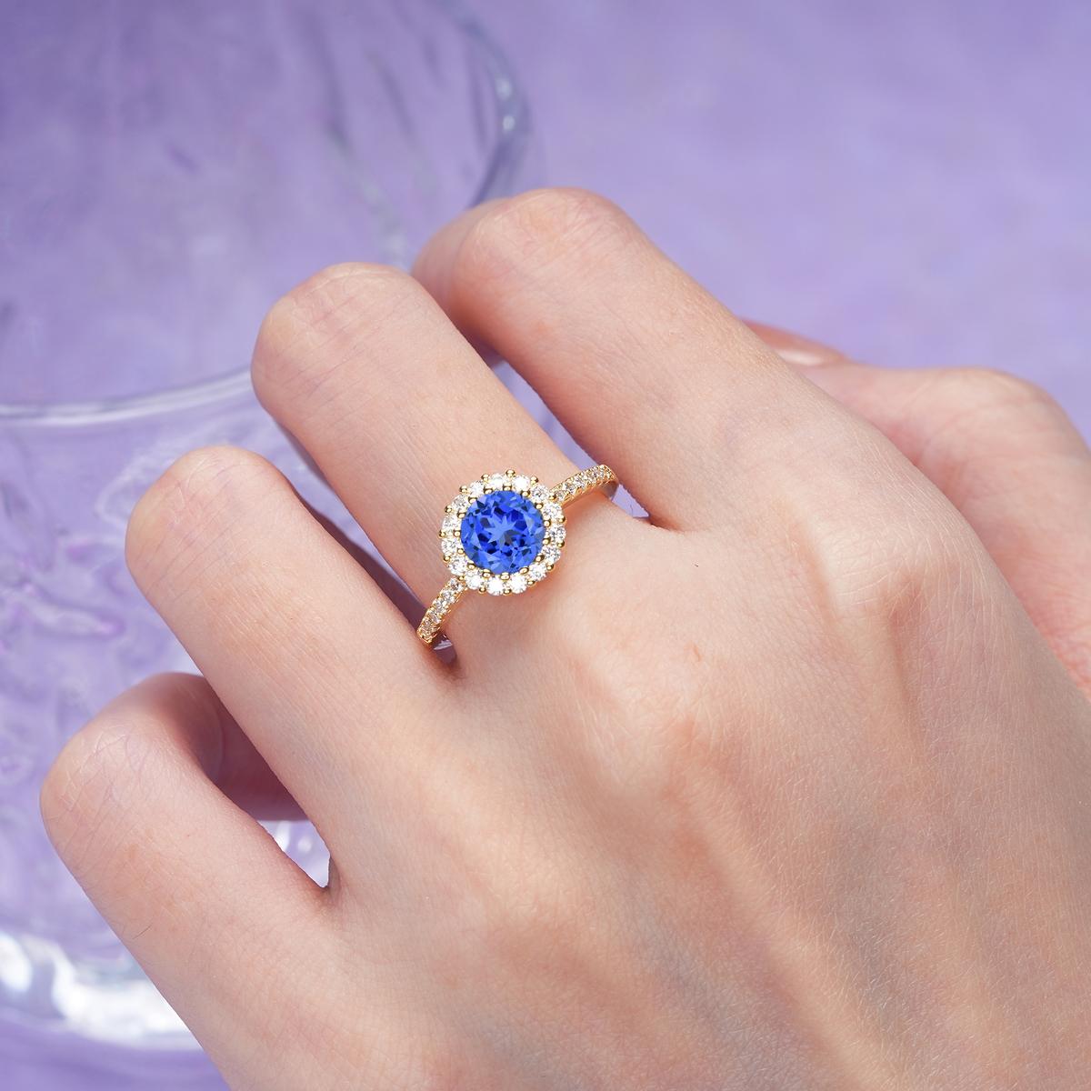 Luxurious and Unique 16 Prong Round Cut Sapphire Engagement Ring