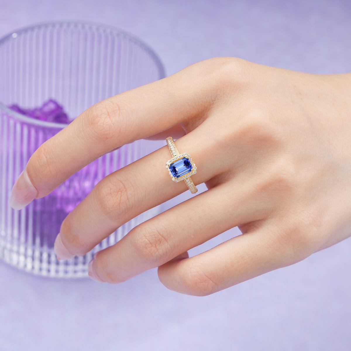Luxurious Vintage 4 Prong Emerald Cut Sapphire Engagement Ring