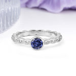 Classic & Minimalist Flush-Set Round-Cut Tanzanite Engagement Ring - Additional view