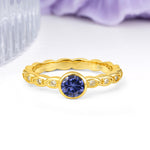 Classic & Minimalist Flush-Set Round-Cut Tanzanite Engagement Ring - Additional view