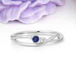 Unique Twisted 4-Prong Round Cut Tanzanite Engagement Ring - Additional view