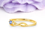 Unique Twisted 4-Prong Round Cut Sapphire Engagement Ring - Additional view