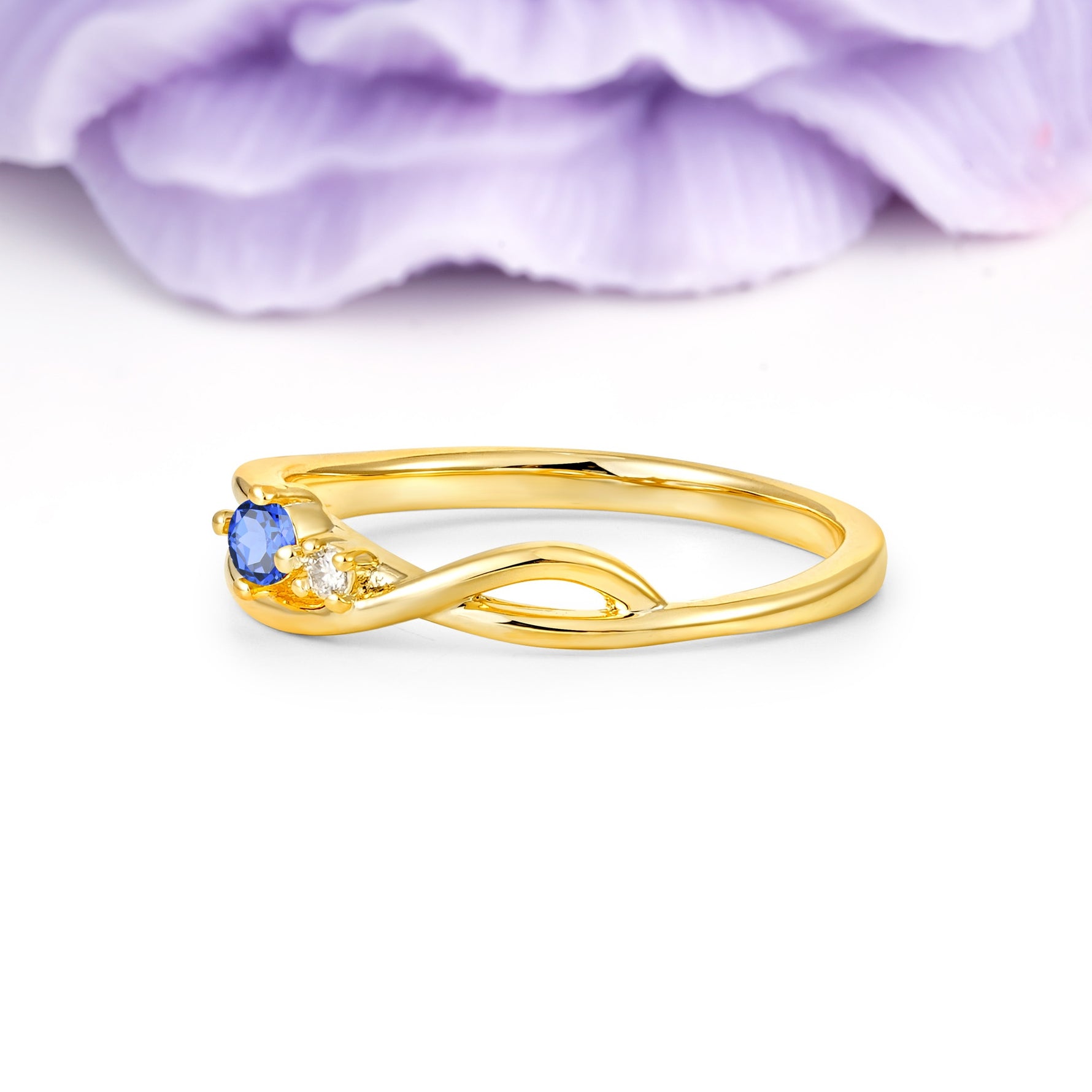 Unique Twisted 4-Prong Round Cut Sapphire Engagement Ring - Additional view
