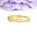 Unique Twisted 4-Prong Round Cut Aquamarine Engagement Ring - Additional view