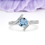 Unique Twisted 4 Prong Round Cut Aquamarine Engagement Ring - Additional view