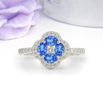 Unique Flower-Shaped 4-Prong Oval Cut Sapphire Engagement Ring - Additional view