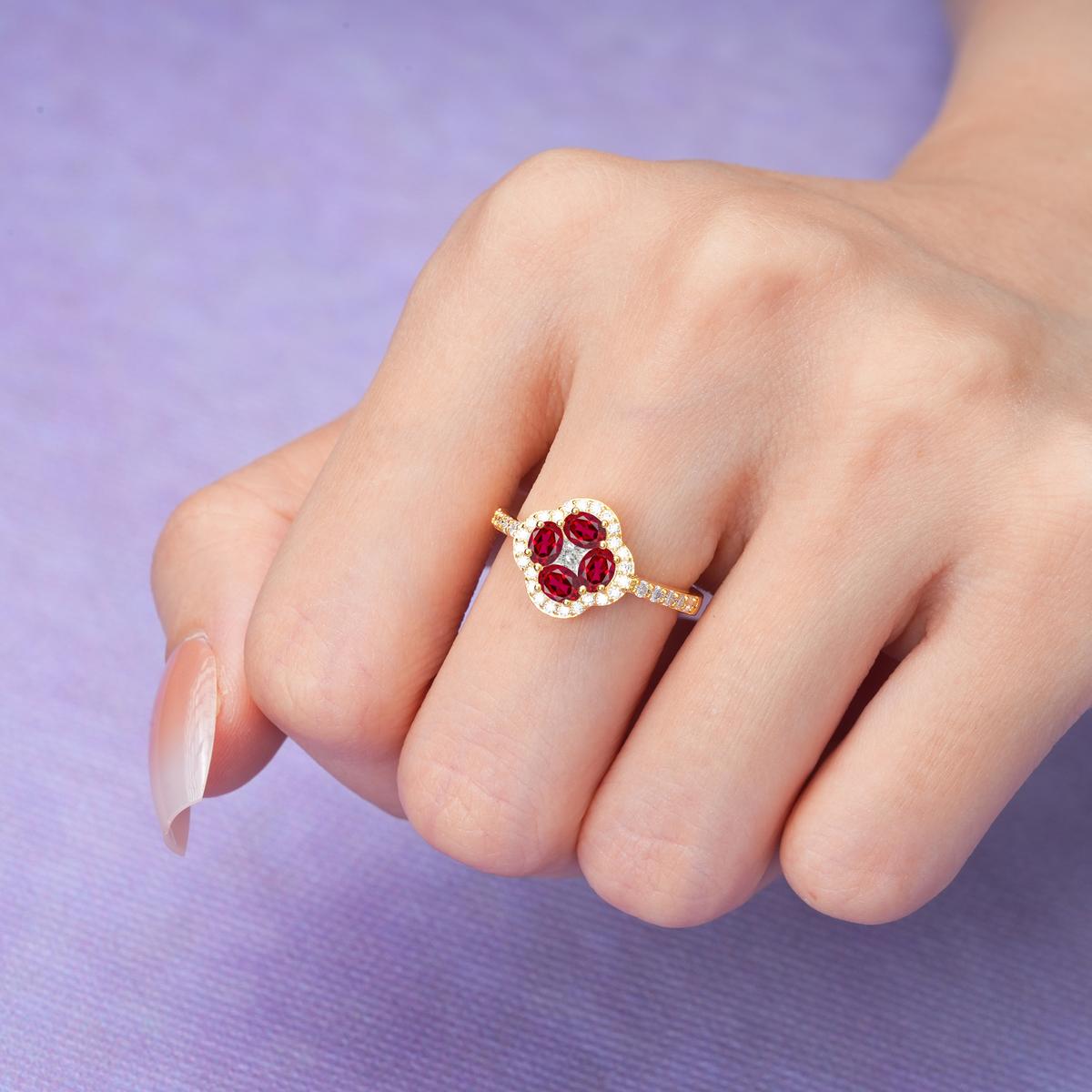Unique Flower-Shaped 4-Prong Oval Cut Ruby Engagement Ring