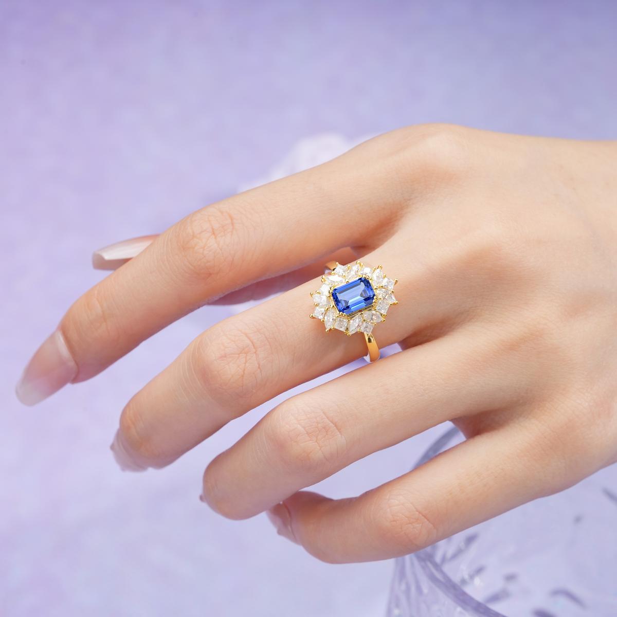 Unique & Classic 4-Prong Emerald Cut Sapphire Engagement Ring
