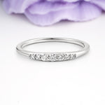Distinctive 4 Prong Round Cut Moissanite Wedding Ring - Additional view