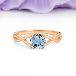 Classic Twisted 4-Prong Round Cut Aquamarine Engagement Ring - Additional view