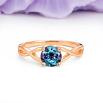 Classic Twisted 4-Prong Round Cut Alexandrite Engagement Ring - Additional view