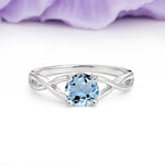 Classic Twisted 4-Prong Round Cut Aquamarine Engagement Ring - Additional view