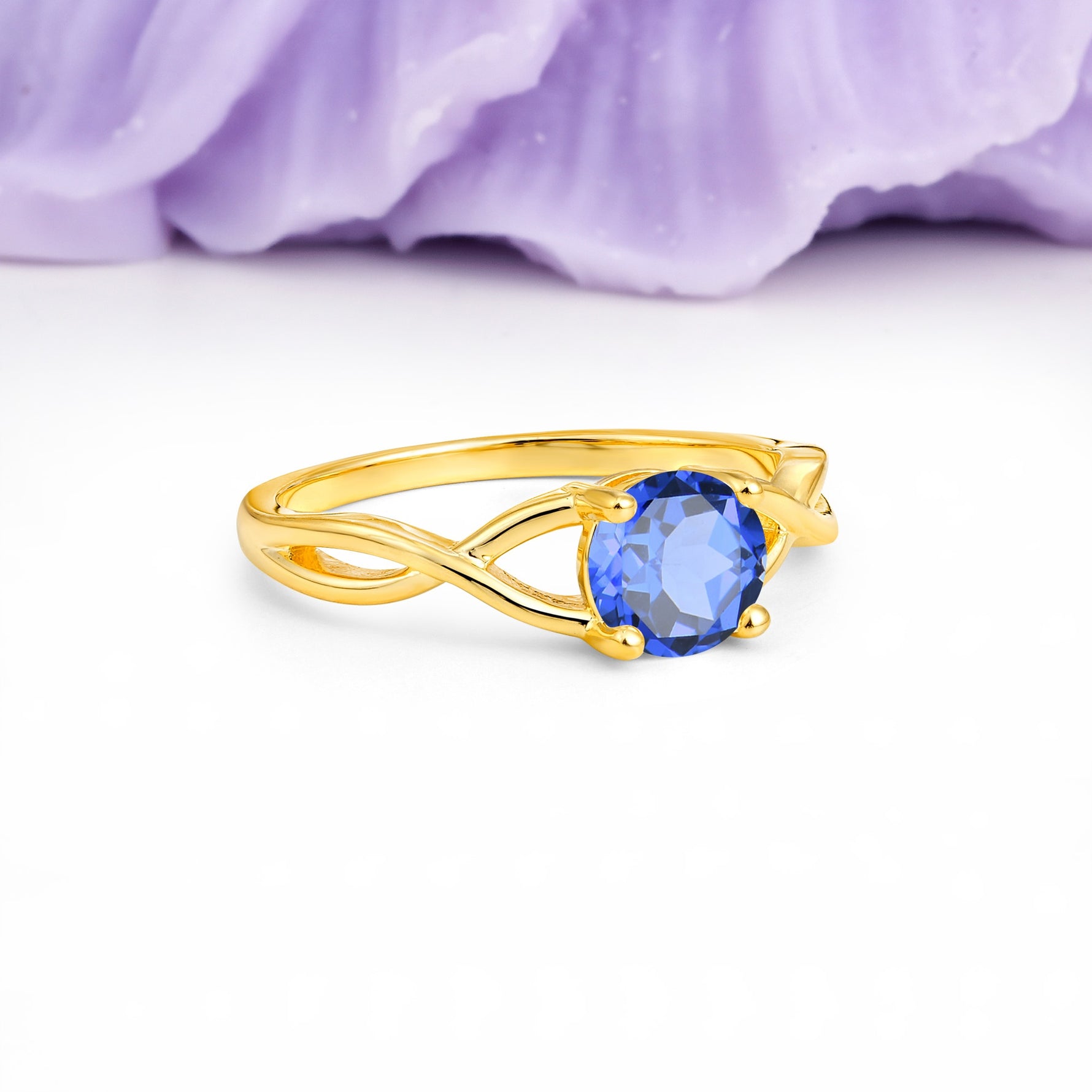 Classic Twisted 4-Prong Round Cut Sapphire Engagement Ring - Additional view
