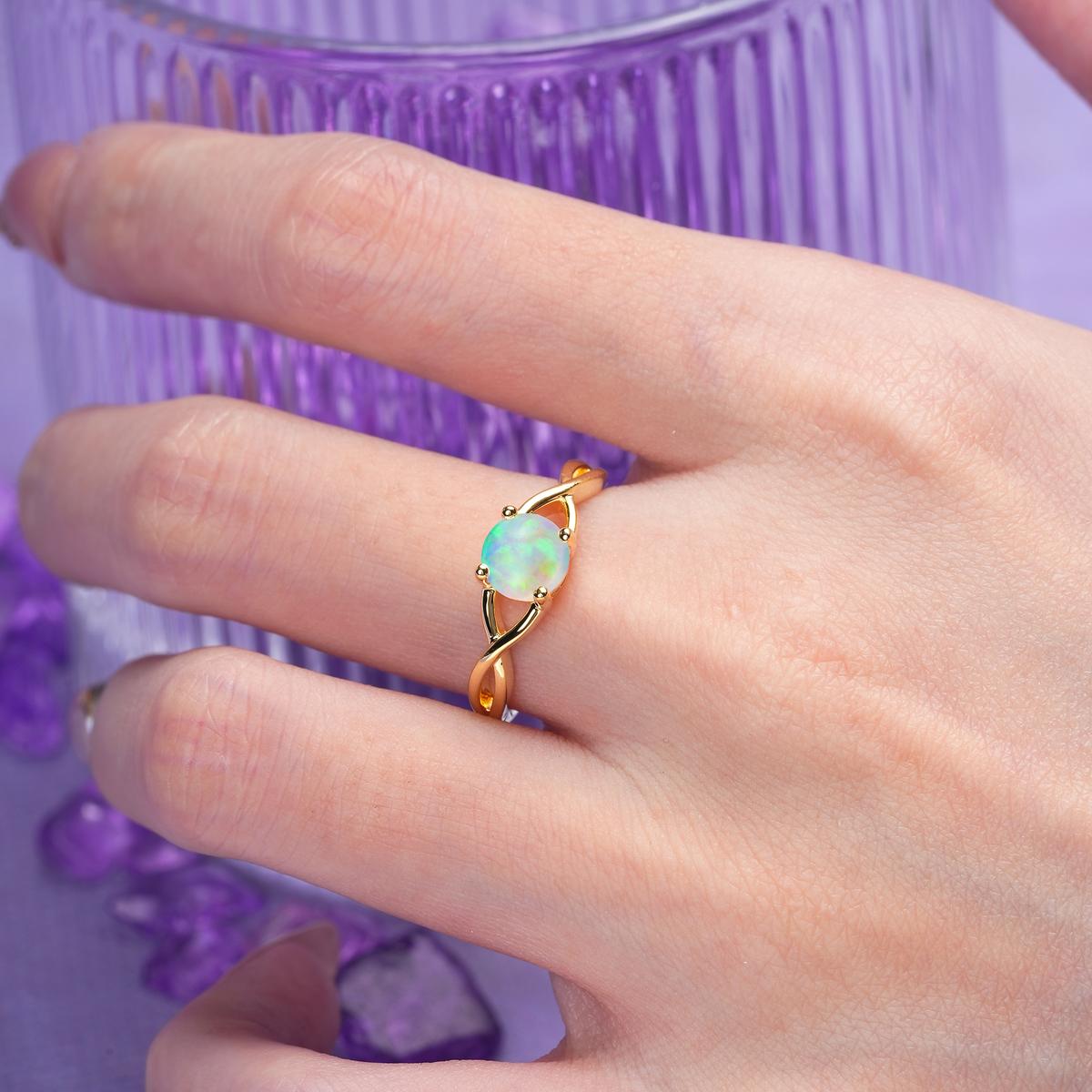 Classic Twisted 4-Prong Round Cut Fire Opal Engagement Ring