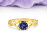 Classic Twisted 4-Prong Round Cut Tanzanite Engagement Ring - Additional view
