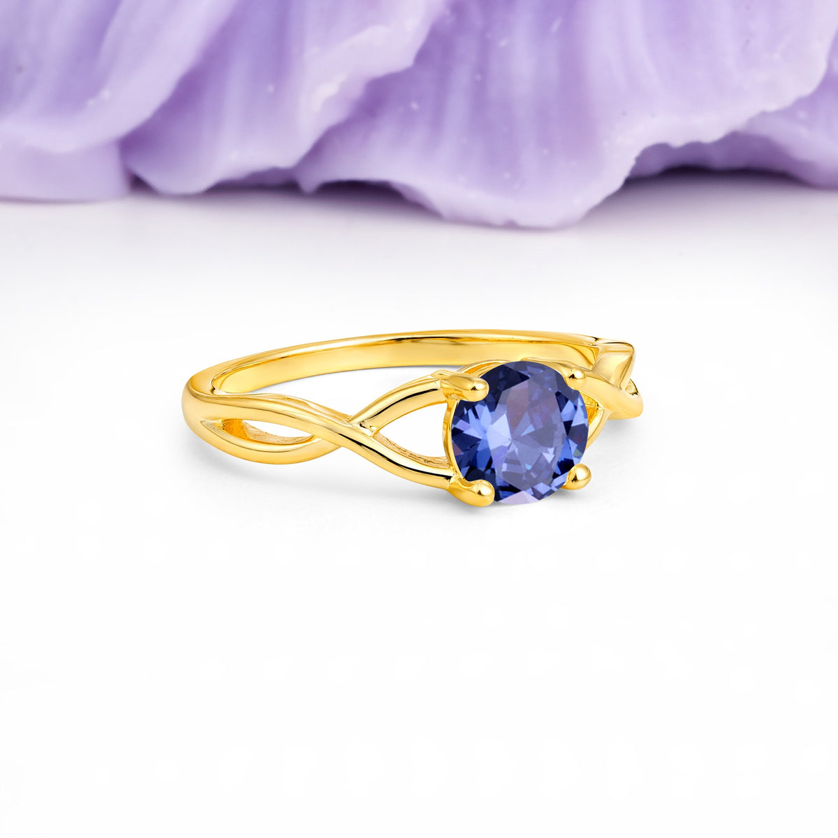 Classic Twisted 4-Prong Round Cut Tanzanite Engagement Ring - Additional view