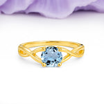 Classic Twisted 4-Prong Round Cut Aquamarine Engagement Ring - Additional view