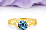 Classic Twisted 4-Prong Round Cut Alexandrite Engagement Ring - Additional view