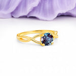 Classic Twisted 4-Prong Round Cut Alexandrite Engagement Ring - Additional view