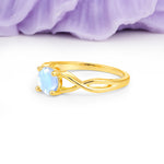 Classic Twisted 4-Prong Round Cut Moonstone Engagement Ring - Additional view