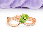 Classic Twisted 3-Prong Pear Cut Peridot Engagement Ring - Additional view