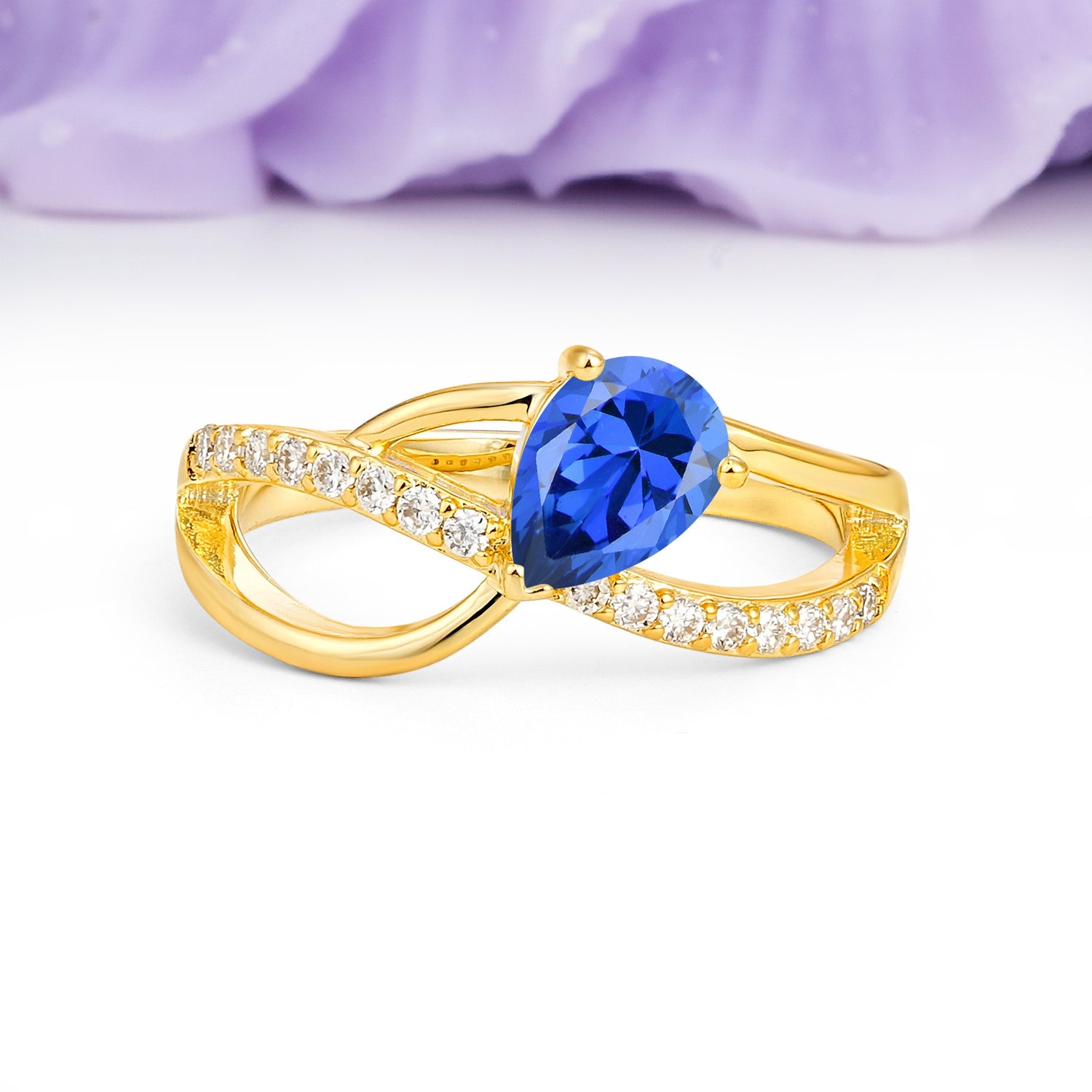 Classic Twisted 3-Prong Pear Cut Sapphire Engagement Ring - Additional view