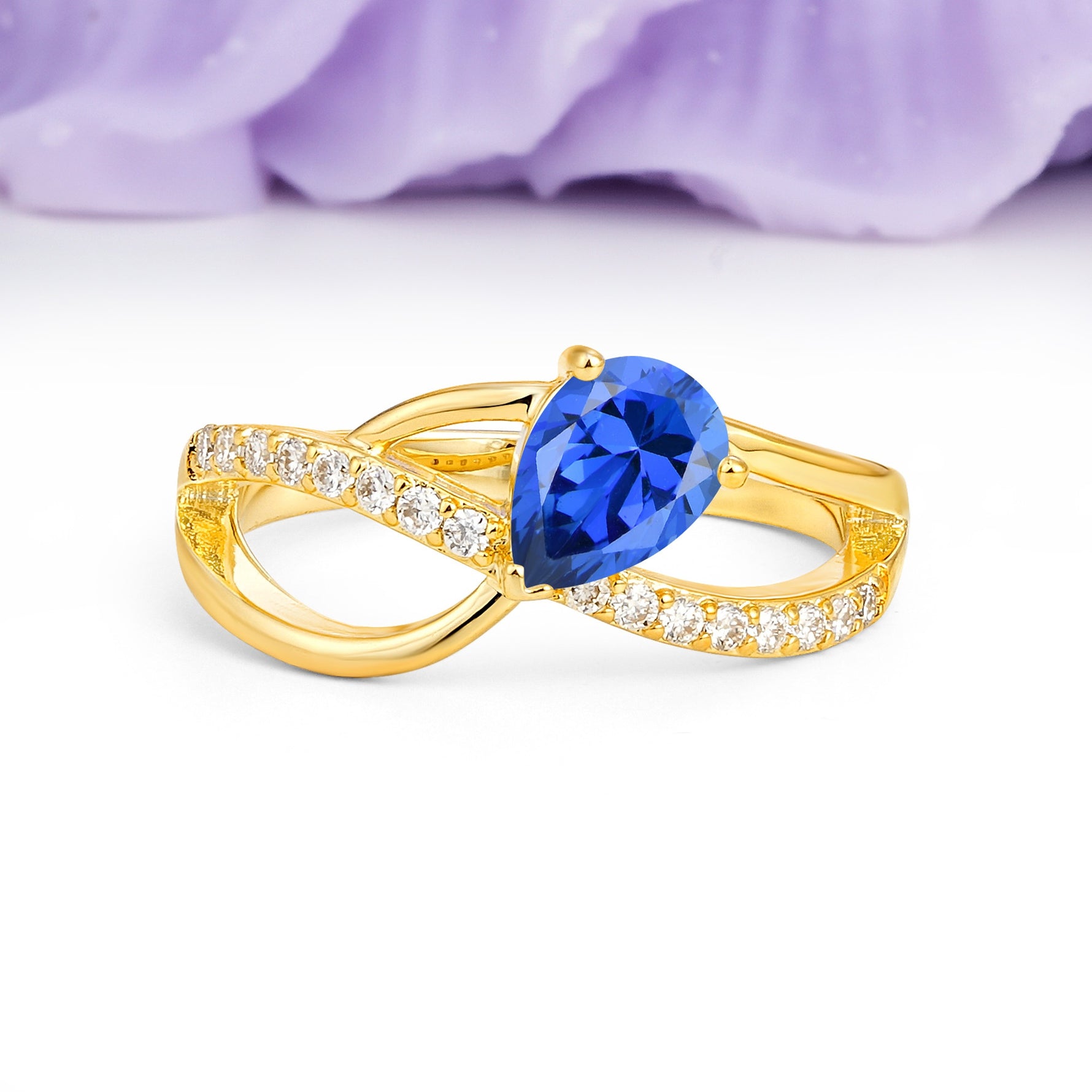Classic Twisted 3-Prong Pear Cut Sapphire Engagement Ring - Additional view