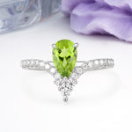 Luxurious Crown 3-Prong Pear Cut Peridot Engagement Ring - Additional view