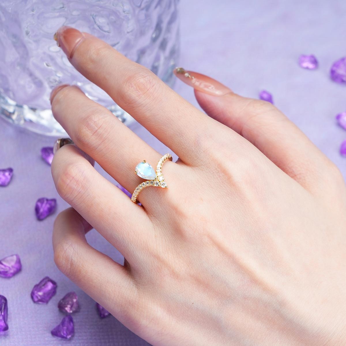 Luxurious Crown 3-Prong Pear Cut Moonstone Engagement Ring
