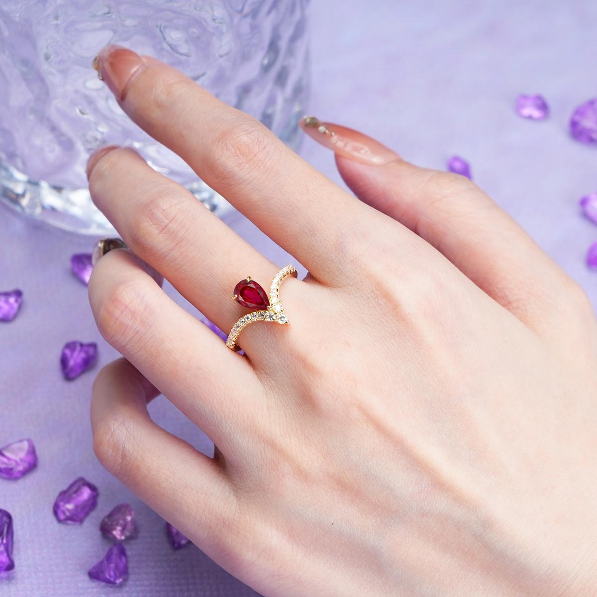 Luxurious Crown 3-Prong Pear Cut Ruby Engagement Ring