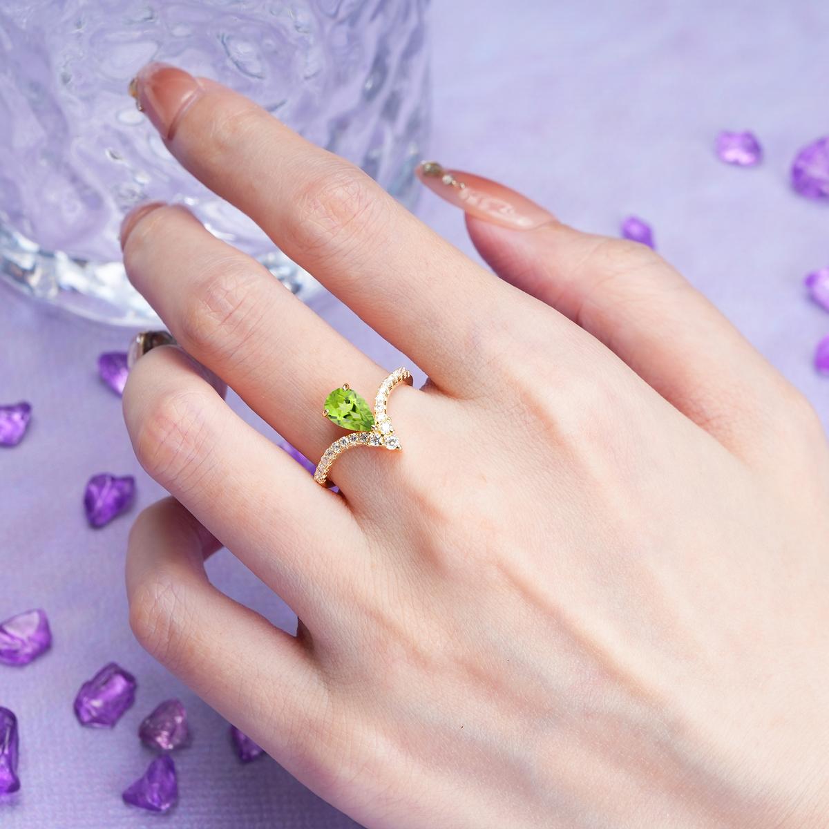 Luxurious Crown 3-Prong Pear Cut Peridot Engagement Ring