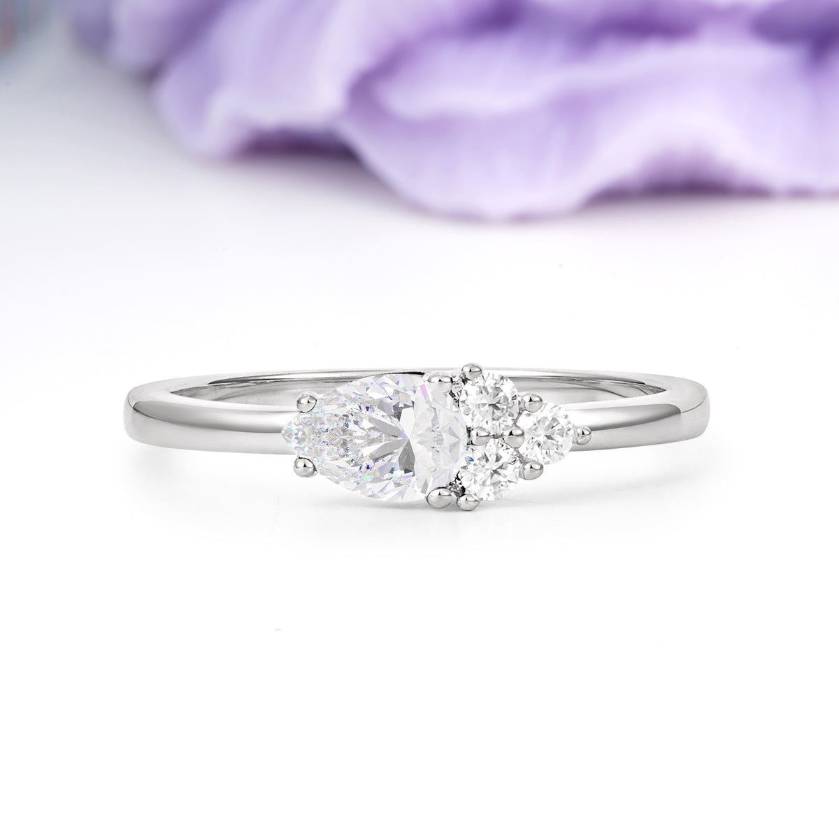 Unique, Minimalist 4-Prong Pear Cut Moissanite Engagement Ring - Additional view