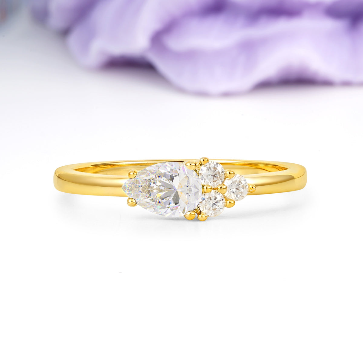 Unique, Minimalist 4-Prong Pear Cut Moissanite Engagement Ring - Additional view