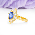 Stunning Starburst Floral Halo Round Cut Sapphire Engagement Ring - Additional view