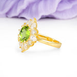 Stunning Starburst Floral Halo Round Cut Peridot Engagement Ring - Additional view