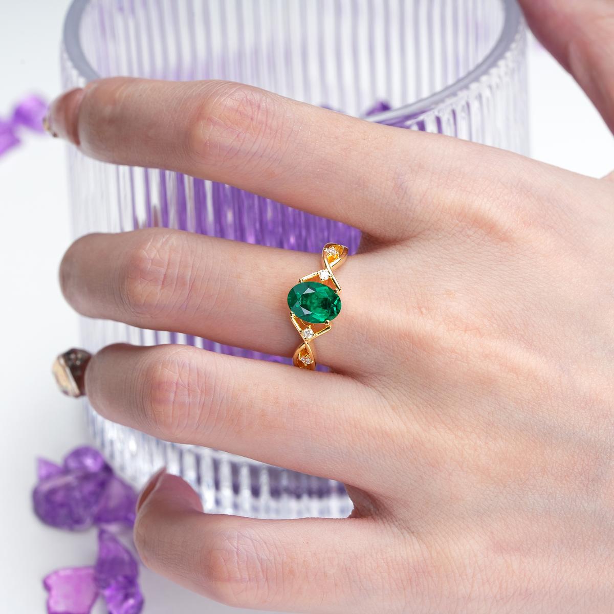 Classic Twisted Luxury 4-Prong Oval Cut Emerald Engagement Ring