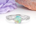 Luxurious Twisted Pavé Setting, 4-Prong Round Cut Fire Opal Engagement Ring - Additional view
