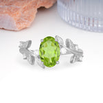 Nature Inspired Oval Cut Four Prong Leaf Vine Accent Peridot Engagement Ring - Additional view