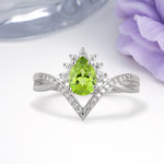 Princess Crown Pear Cut Halo V Shaped Twisted Pave Shank Peridot Engagement Ring - Additional view