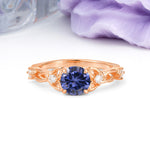 Nature-Inspired Luxury: Openwork 4-Prong Round Cut Tanzanite Engagement Ring - Additional view