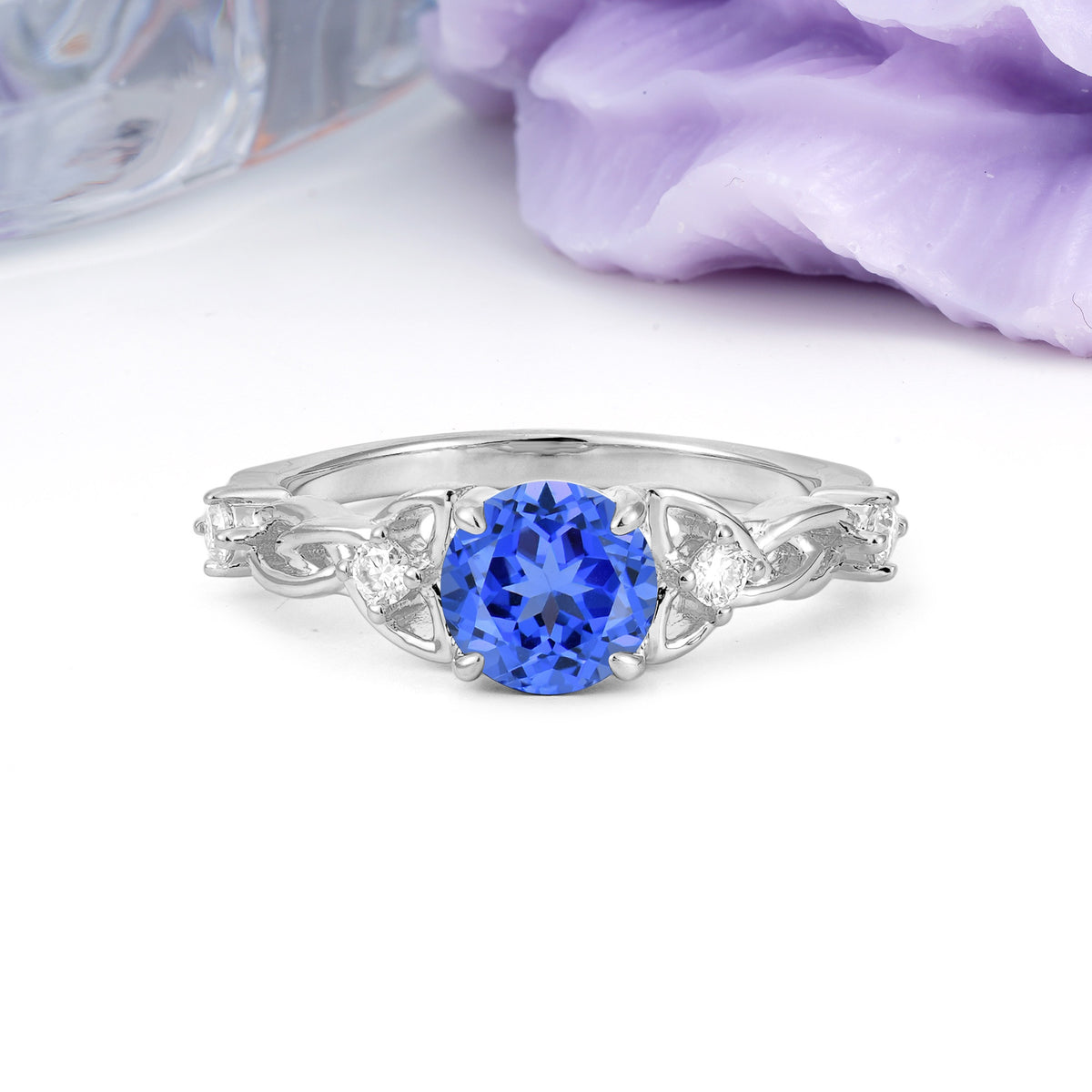 Nature-Inspired Luxury: Openwork 4-Prong Round Cut Sapphire Engagement Ring - Additional view
