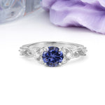 Nature-Inspired Luxury: Openwork 4-Prong Round Cut Tanzanite Engagement Ring - Additional view