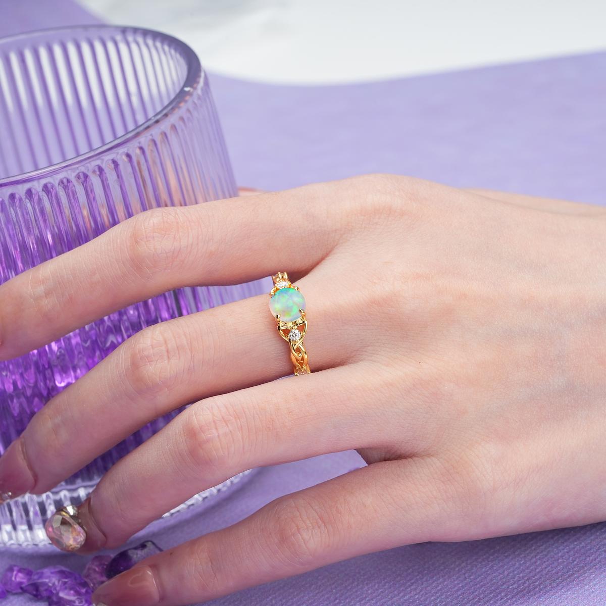 Nature-Inspired Luxury: Openwork 4-Prong Round Cut Fire Opal Engagement Ring