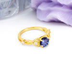 Nature-Inspired Luxury: Openwork 4-Prong Round Cut Tanzanite Engagement Ring - Additional view