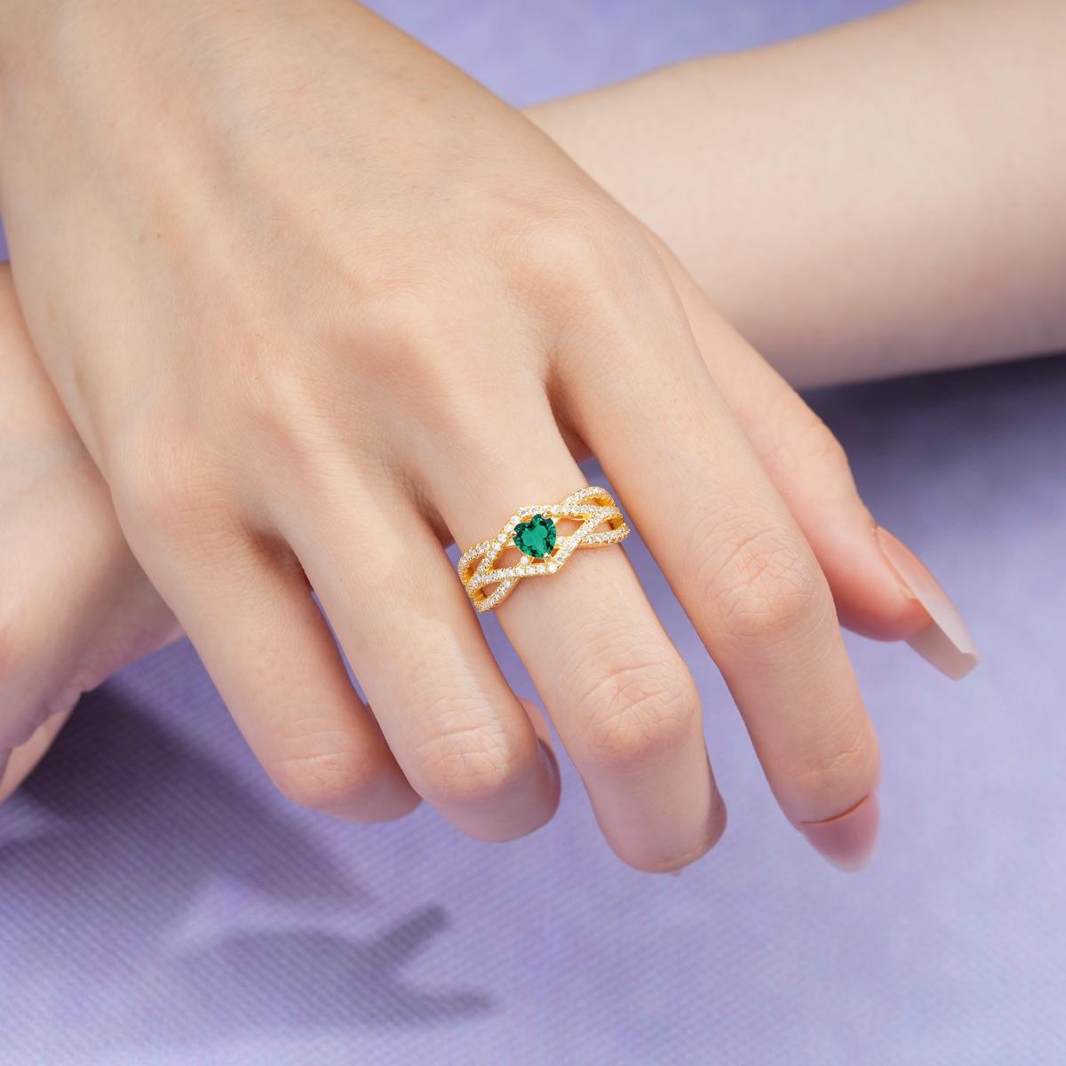 Unique Pavé Setting Surrounding a 3-Prong, Heart-Cut Emerald Engagement Ring