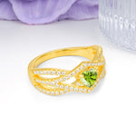 Unique Pavé Setting Surrounding a 3-Prong, Heart-Cut Peridot Engagement Ring - Additional view