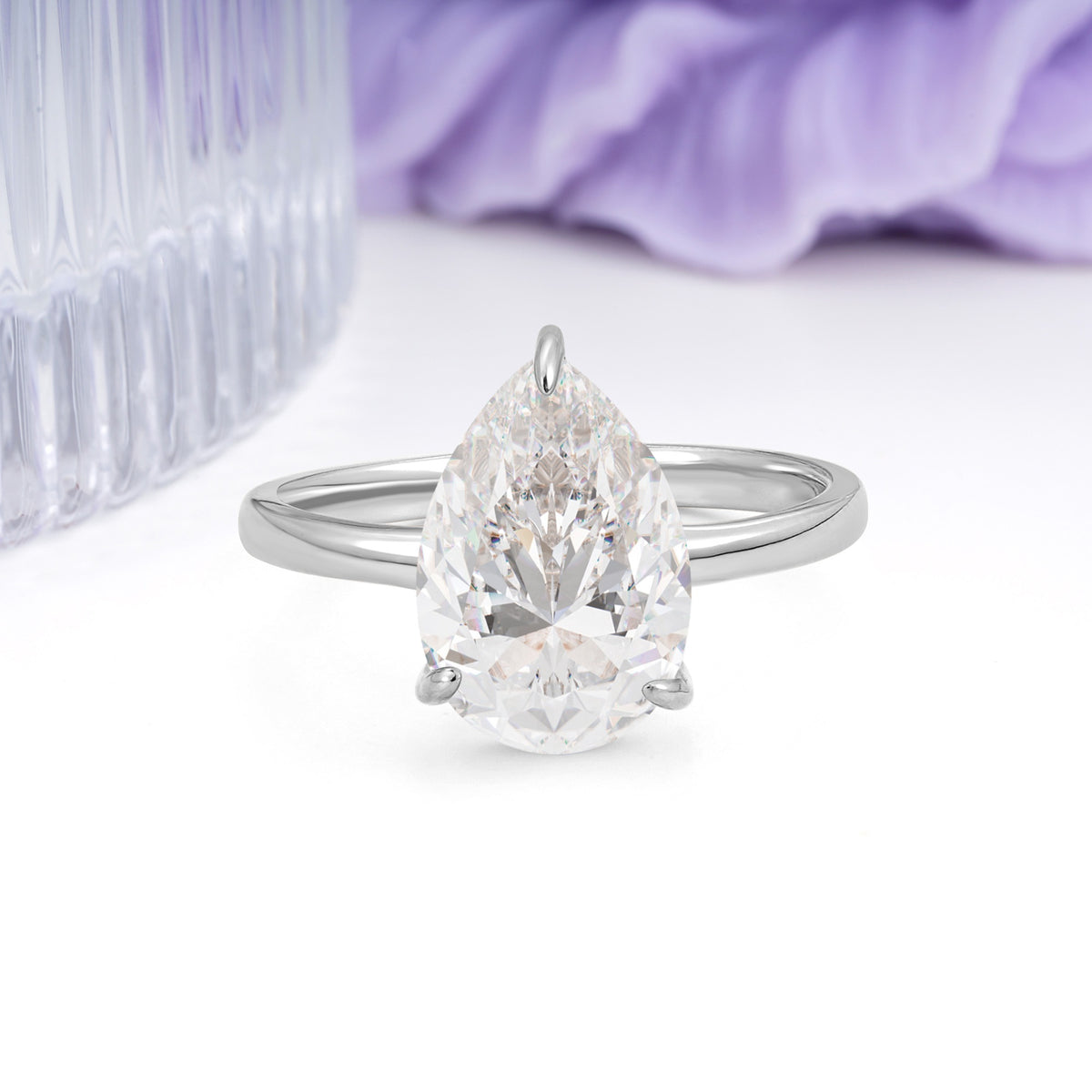 Classic Minimalist 3 Prong Pear Cut Moissanite Engagement Ring - Additional view