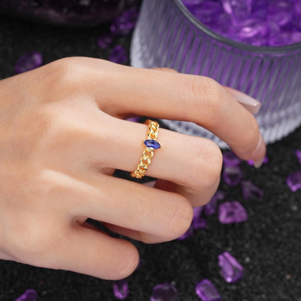 Unique, Minimalist, Twisted 2-Prong Setting with Marquise Cut Tanzanite Engagement Ring