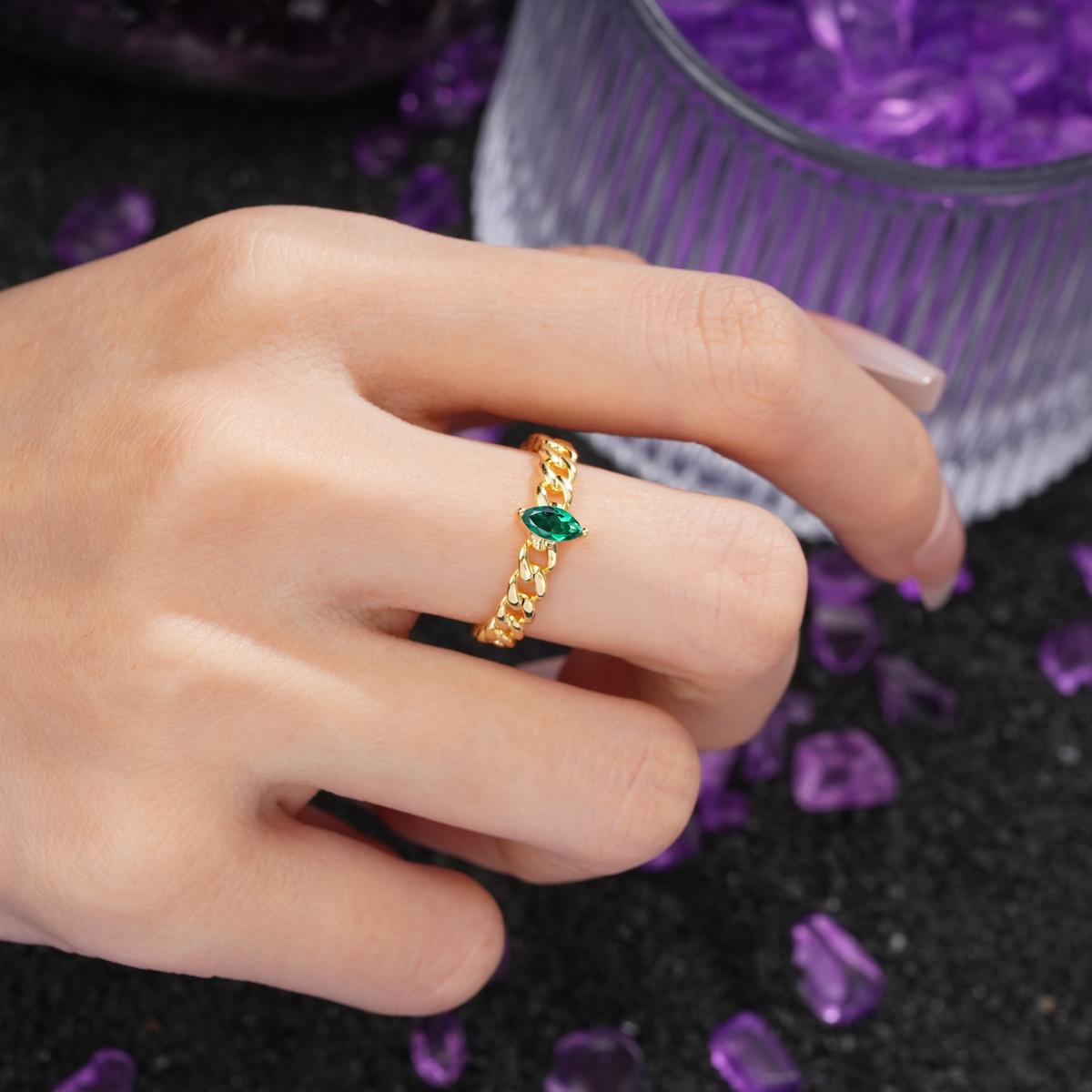 Unique, Minimalist, Twisted 2-Prong Setting with Marquise Cut Emerald Engagement Ring