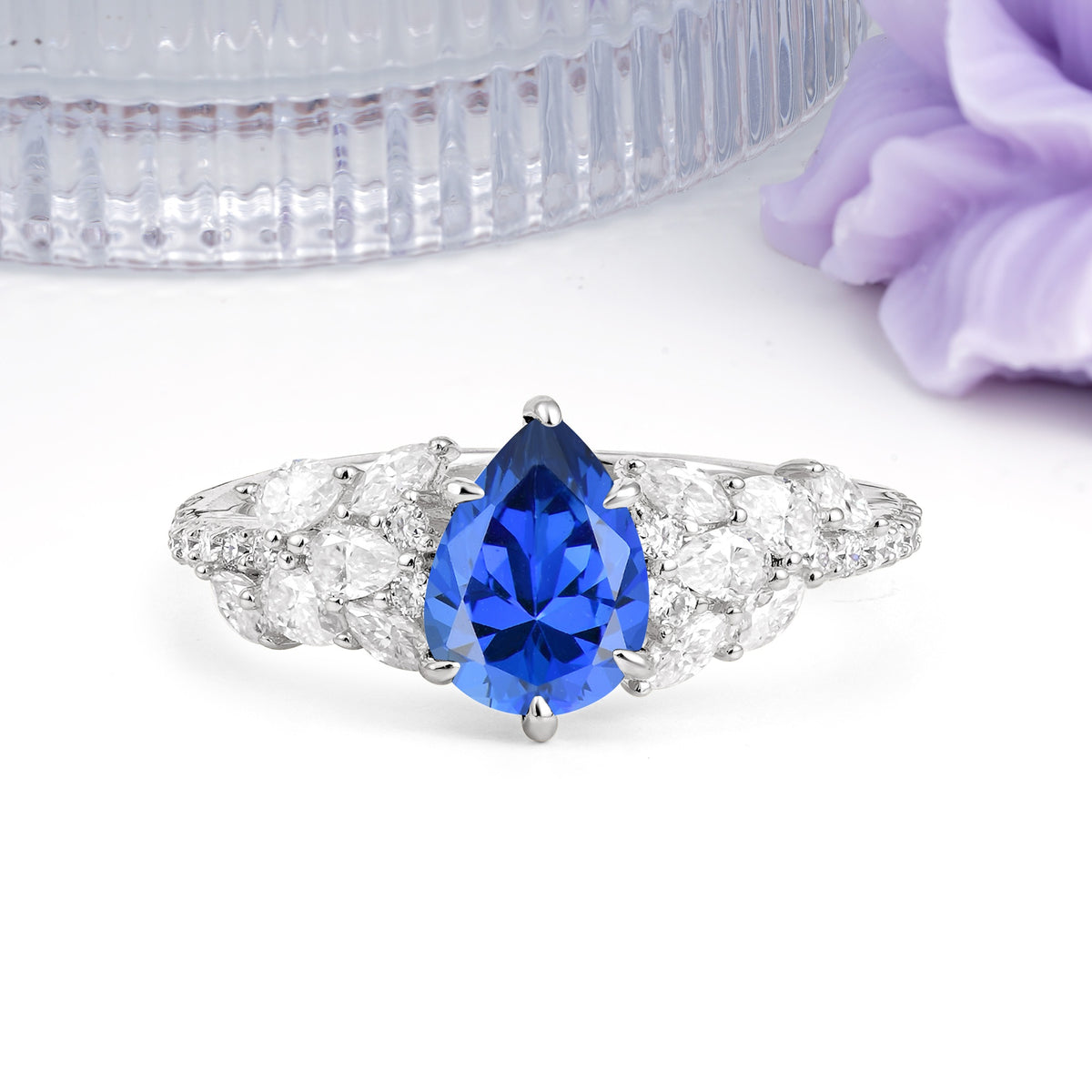 Luxurious Pavé-Set Diamonds, Unique 6-Prong Pear Cut Sapphire Engagement Ring - Additional view